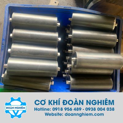 Trục con lăn băng tải